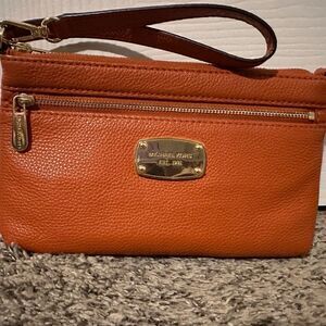 Michael Kors Burnt Orange Pebbled Leather wristlet